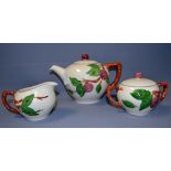 A contemporary three piece ceramic tea s