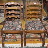 A set of four Ercol style ladder back di