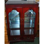 A mahogany two door glazed display cabin