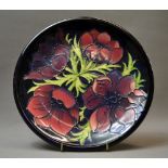 A large Moorcroft 'Blue Anemone' plate.