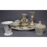 A ceramic dressing table set, together w