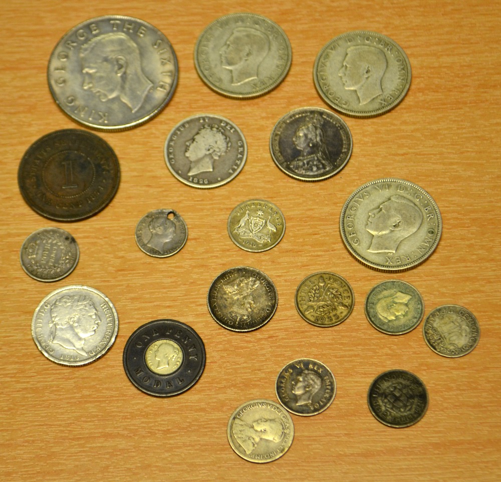 A selection of 19 coins, mostly silver.