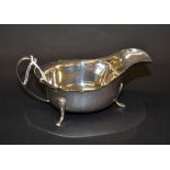 A hallmarked silver sauce boat