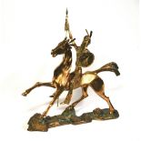 Brian Burgess, a substantial bronze sculpture of a Native American on a stylized horse.