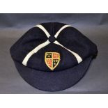 A vintage public school felt cap, navy with white X for the King Edward VI School, Southampton,