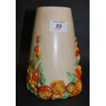 Clarice Cliff, a painted and relief-decorated vase with floral designs. Approximately 19 cm tall.