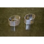 Two octagonal silver napkin rings, 1935, plain cartouche with special silver Jubilee hallmark,