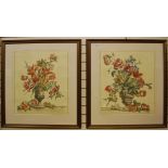 A pair of large hand coloured floral prints. Mounted, framed and glazed.