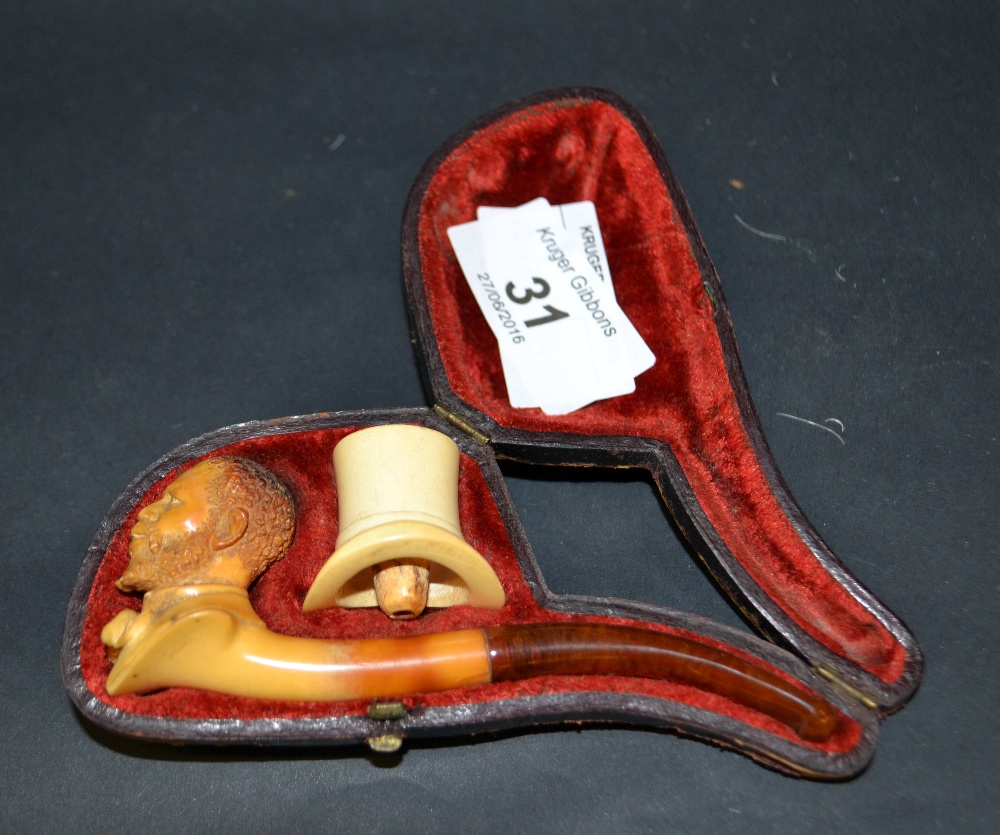 A cased meerschaum pipe,