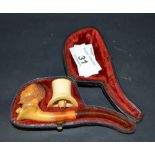 A cased meerschaum pipe,