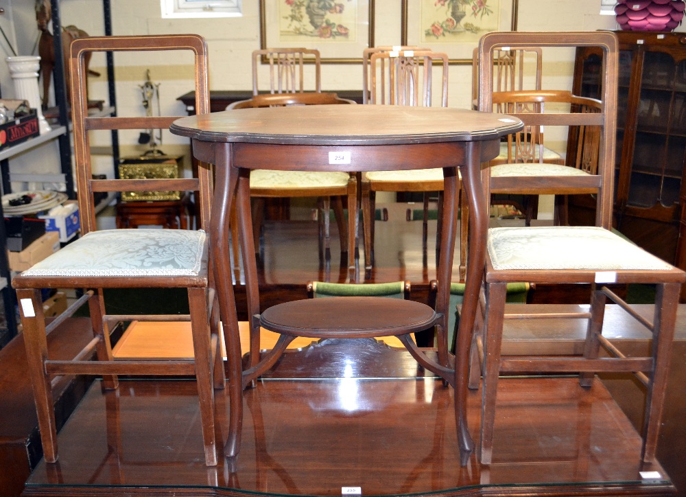 An Edwardian mahogany occasional table a