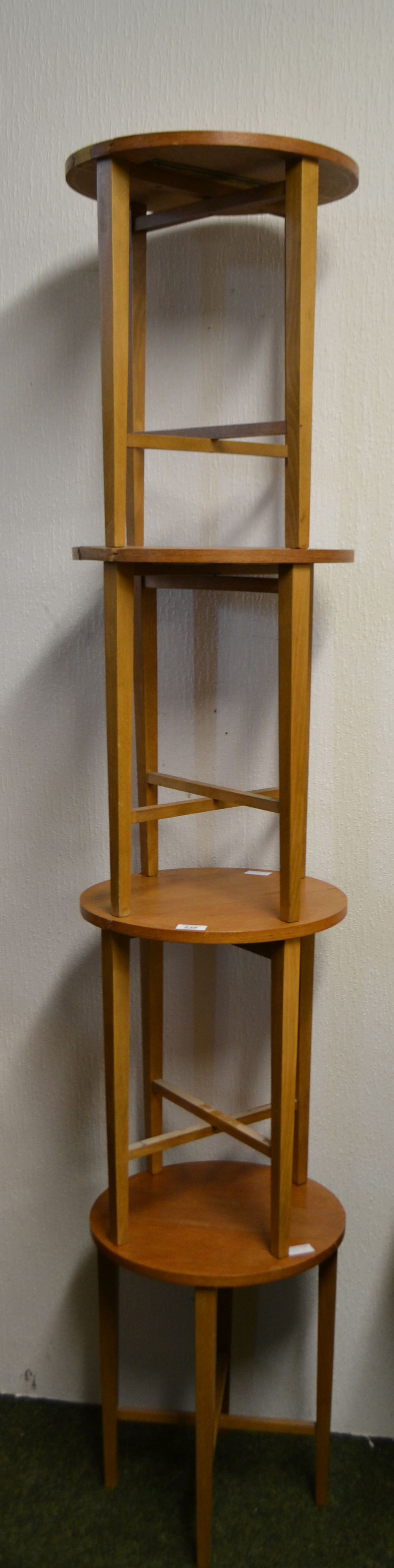 A set of four folding occasional tables