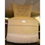 An upholstered bedroom chair