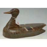 A 19th century painted wooden decoy duck
