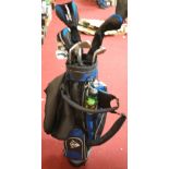 A collection of various Dunlop Max golf clubs and bag