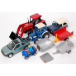 8 assorted Britains and ERTL Farm diecast vehicles and attachments,