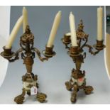 A pair of late 19th century gilt metal and marble four branch candelabra