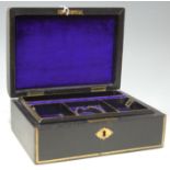 A Victorian leather clad jewellery casket having a fitted interior