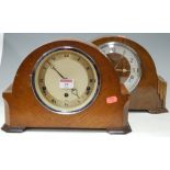 An Art Deco walnut cased mantel clock having silvered dial with Arabic numerals together with one