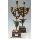 A pair of late 19th century gilt metal and marble mounted five sconce candelabra