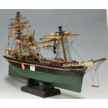 A scale model ship of the Ellis land