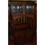 An Art Nouveau Glasgow School style mahogany and inlaid side cabinet,