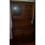 An oak bookcase cupboard