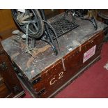 A late 19th century stained pine and metal bound hinged top military travelling trunk
Provenance: