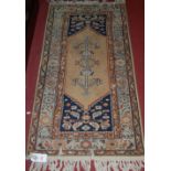 A Luristan machine woven woollen rug 65x138cm,