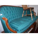 A Louis XV style green striped upholstered button back three seater canape