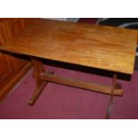 A 1970s teak two tier occasional table,