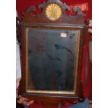 A giltwood and gesso wall mirror; Chippendale style walnut framed wall mirror;