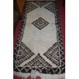 A circa 2000 Moroccan Berber deep pile woollen rug 90x202cm