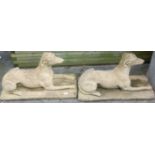 A pair of reconstituted stone garden figures,