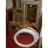 A Victorian style gilt framed overmantel mirror;