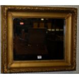 A 19th century giltwood rectangular wall mirror (re-gilded and probably formerly a picture frame)