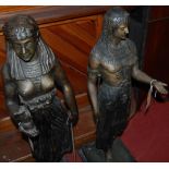 A pair of contemporary Egyptian style bronze standing figures of a semi-nude male and female