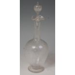 A circa 1900 glass decanter and stopper, having all-over wheel engraved floral decoration, h.
