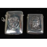 An Edwardian silver vesta, of rectangular form, relief decorated with a pixie within a horseshoe,