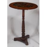 A circa 1830 faux rosewood and walnut pedestal occasional table,