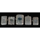A late Victorian silver vesta, of rectangular form, all-over engraved with birds amongst flowers,