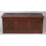 A late 17th century joined and line carved oak three panelled hinged top coffer, h.