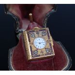 A jewelled gold and enamel watch and picture locket pendant,