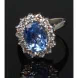 A ladies 18ct white gold sapphire and diamond dress ring, the oval cut sapphire weighing approx 3ct,