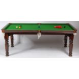 A George G Bussey & Co stained beechwood and slate bed snooker dining table,
