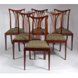 A set of six Edwardian mahogany and satinwood strung dining chairs,