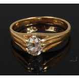 An 18ct gold diamond solitaire ring, the claw set old brilliant cut diamond weighing approx 0.