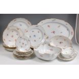 An extensive late 19th century Meissen porcelain part dinner service, comprising; 20 dinner plates,