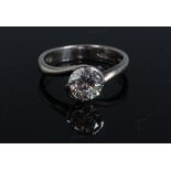 A ladies platinum and diamond solitaire ring, the brilliant cut diamond weighing 1.