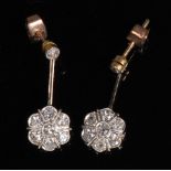 A pair of early 20th century yellow metal diamond set ear pendants,